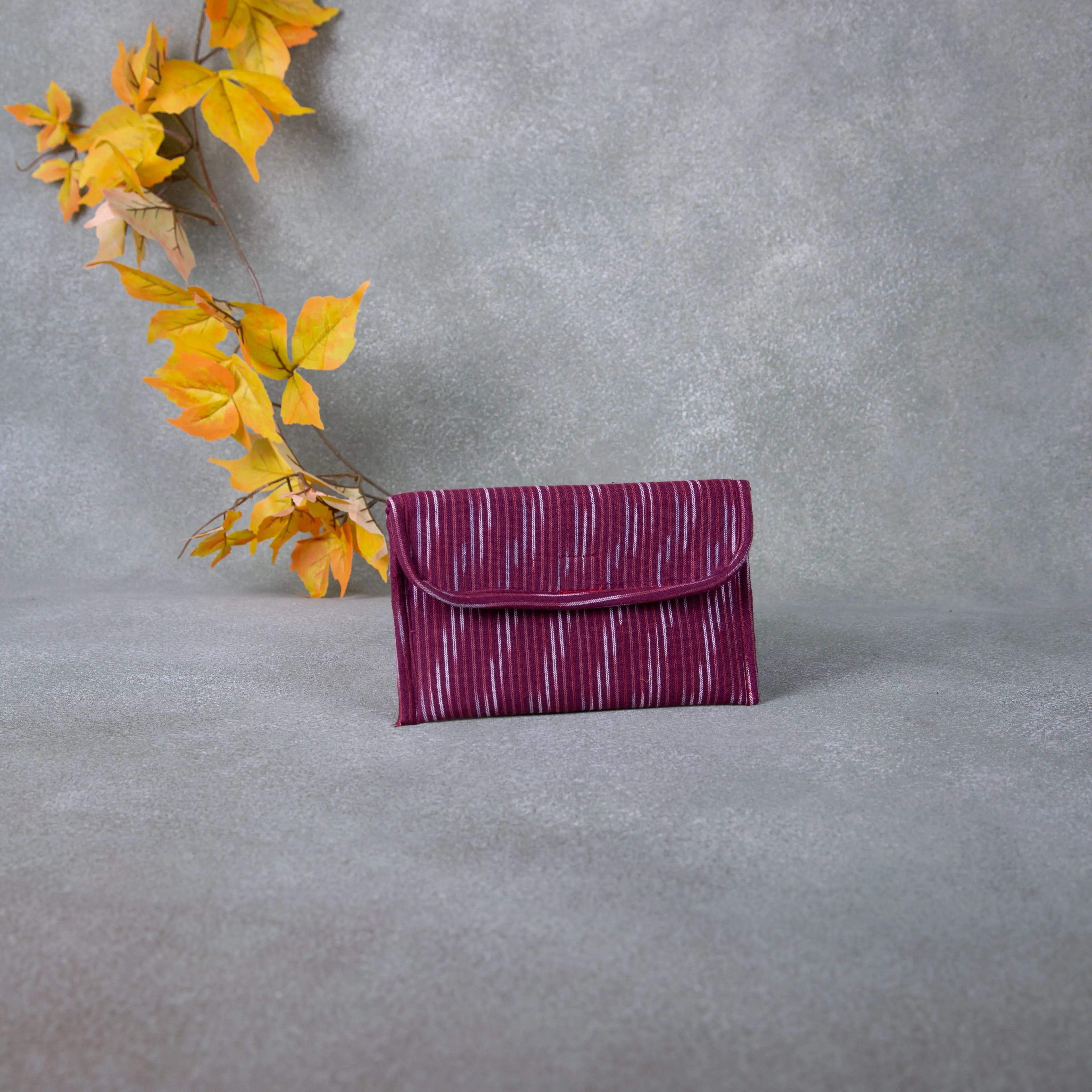 Ikat Clutch Maroon Colour with zig zag Design.