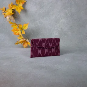 Ikat Clutch Maroon Colour with zig zag Design.